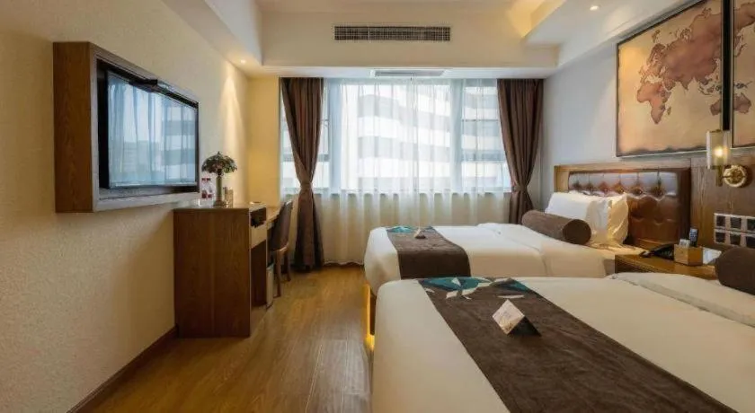 Bed in James Joyce Coffetel Kunming Railway Station Huancheng Nan Road Metro Station