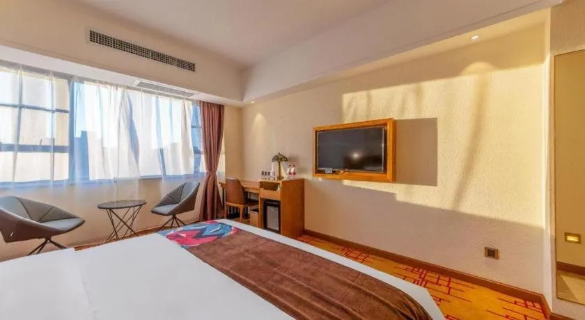 Bed in James Joyce Coffetel Kunming Railway Station Huancheng Nan Road Metro Station