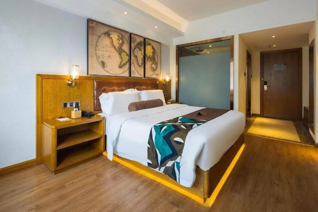 Bed in James Joyce Coffetel Kunming Railway Station Huancheng Nan Road Metro Station