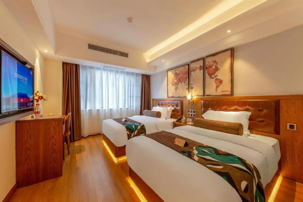 Bed in James Joyce Coffetel Kunming Railway Station Huancheng Nan Road Metro Station