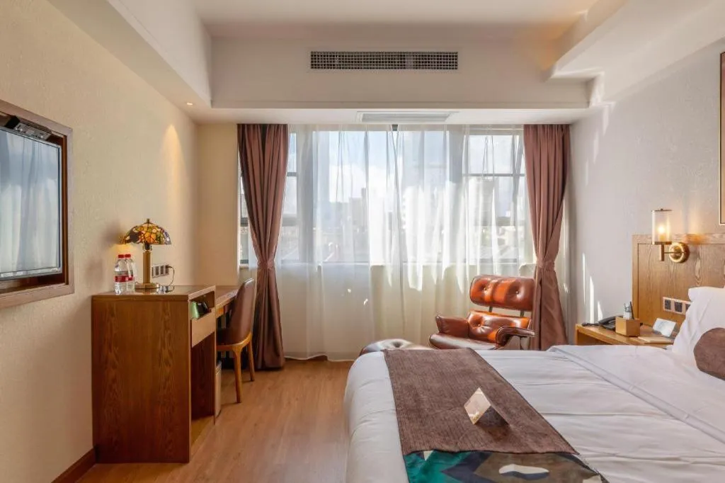 Bed in James Joyce Coffetel Kunming Railway Station Huancheng Nan Road Metro Station