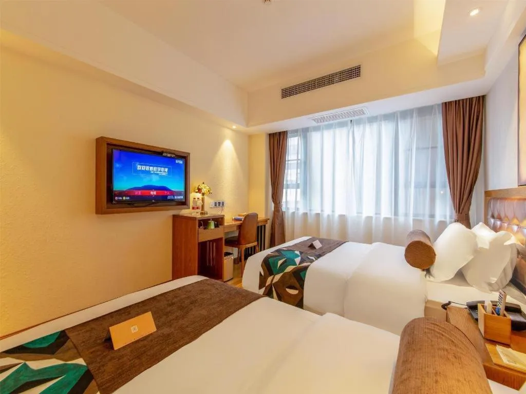 Bed in James Joyce Coffetel Kunming Railway Station Huancheng Nan Road Metro Station