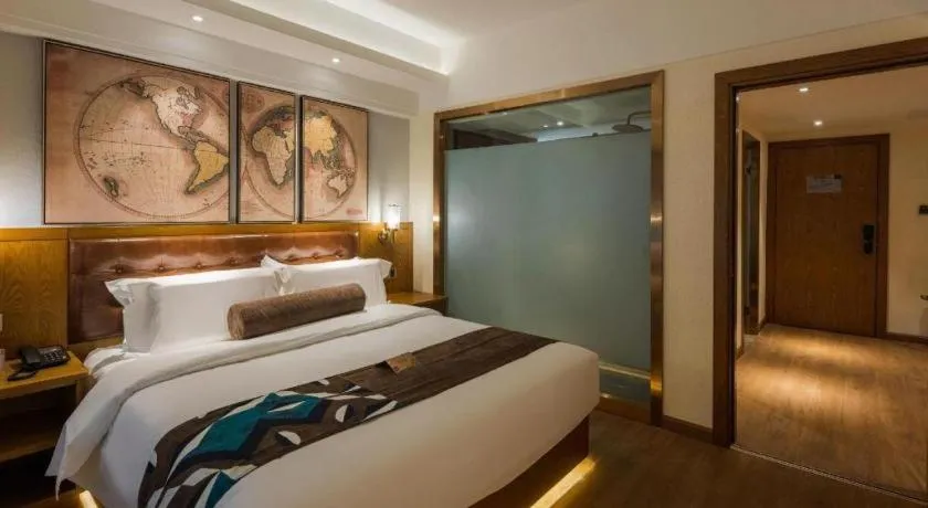 Bed in James Joyce Coffetel Kunming Railway Station Huancheng Nan Road Metro Station