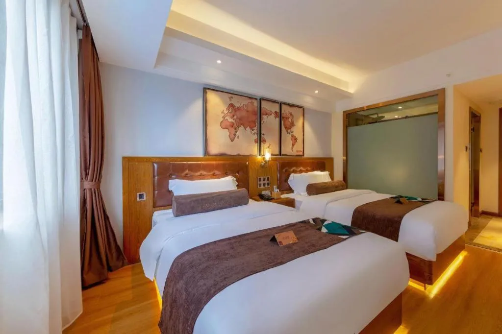 Bed in James Joyce Coffetel Kunming Railway Station Huancheng Nan Road Metro Station