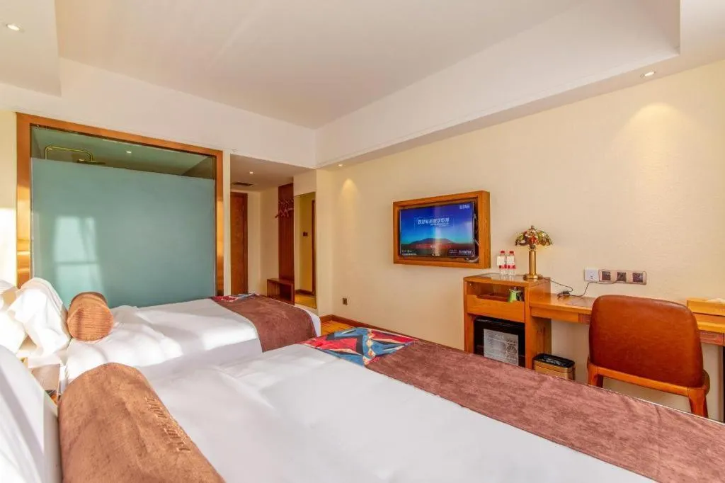 Bed in James Joyce Coffetel Kunming Railway Station Huancheng Nan Road Metro Station