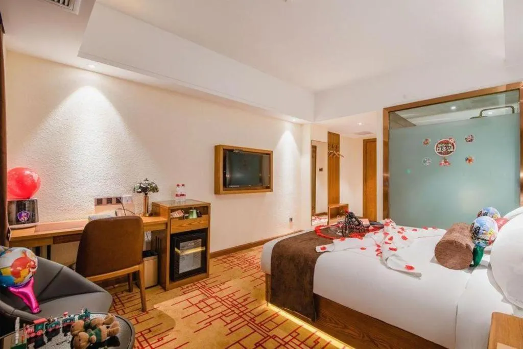 Bed in James Joyce Coffetel Kunming Railway Station Huancheng Nan Road Metro Station