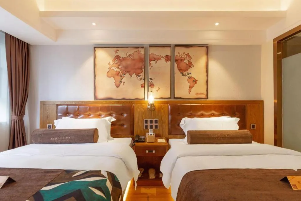 Bed in James Joyce Coffetel Kunming Railway Station Huancheng Nan Road Metro Station