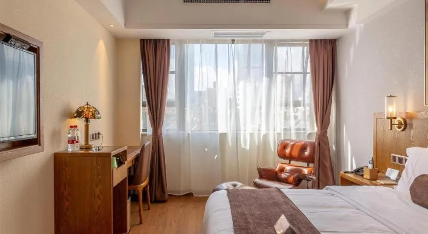 Bed in James Joyce Coffetel Kunming Railway Station Huancheng Nan Road Metro Station