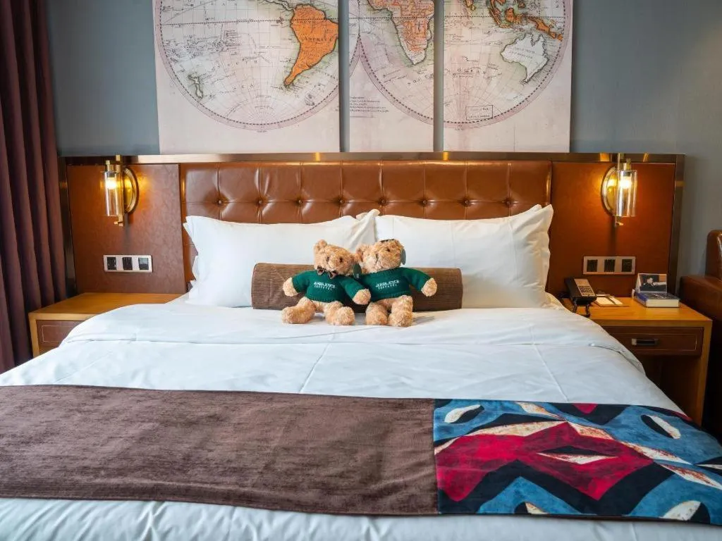 Bed in James Joyce Coffetel Kunming Railway Station Huancheng Nan Road Metro Station