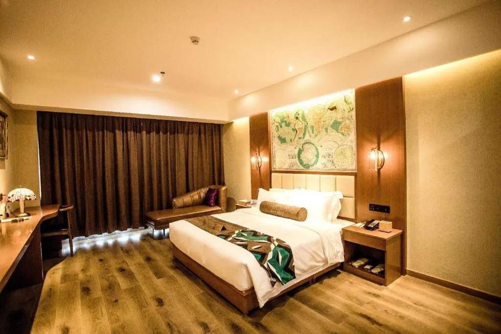 Bed in James Joyce Coffetel Xinyang Municipal Government Railway Station