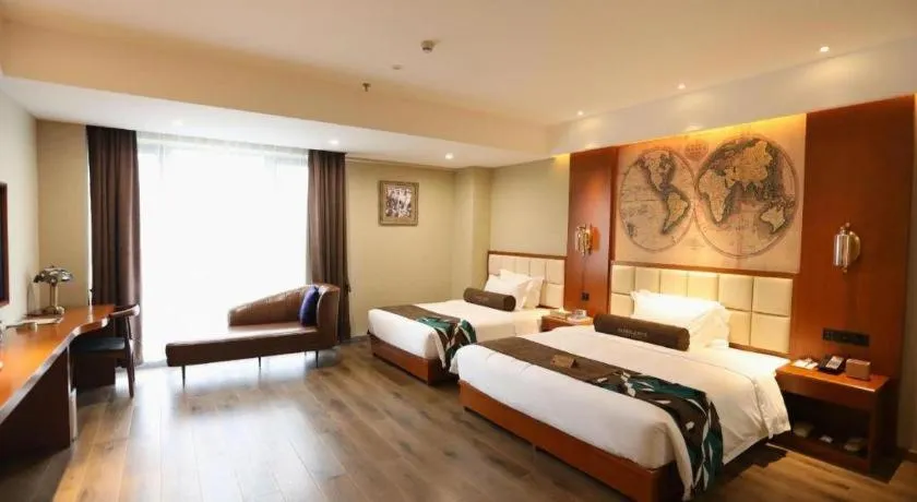 Bed in James Joyce Coffetel Xinyang Municipal Government Railway Station