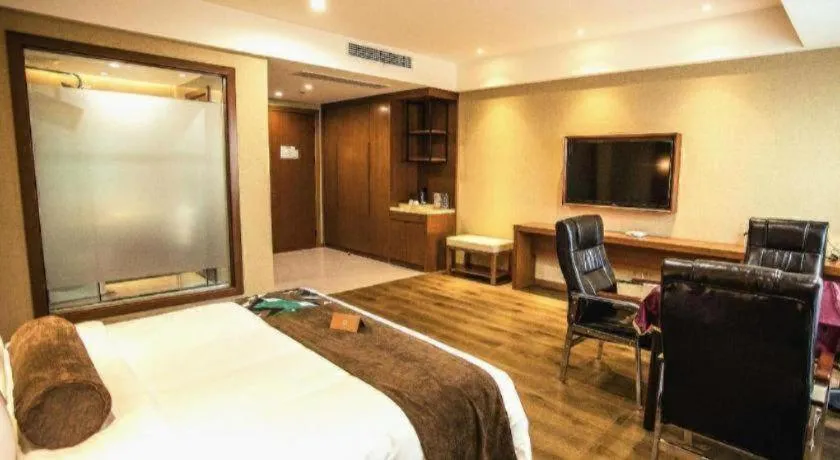 Bed in James Joyce Coffetel Xinyang Municipal Government Railway Station