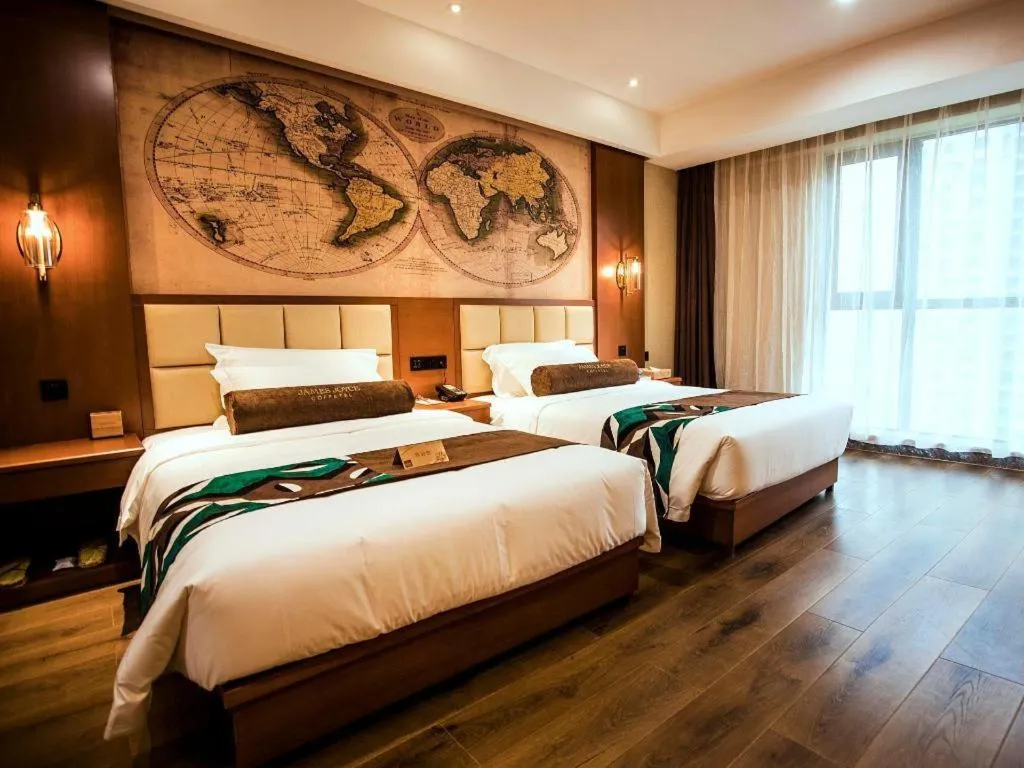 Bed in James Joyce Coffetel Xinyang Municipal Government Railway Station