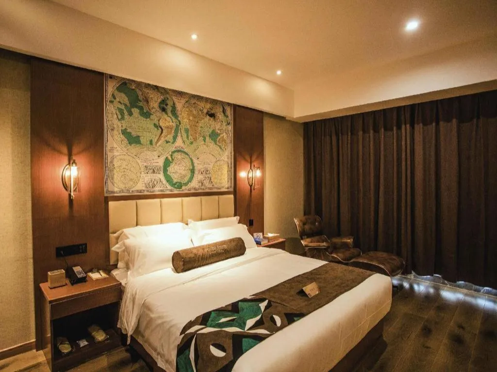 Bed in James Joyce Coffetel Xinyang Municipal Government Railway Station