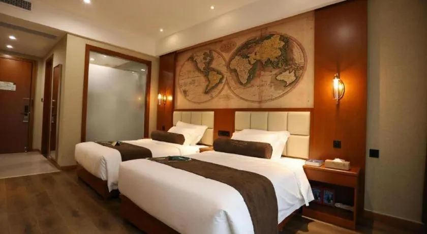 Bed in James Joyce Coffetel Xinyang Municipal Government Railway Station