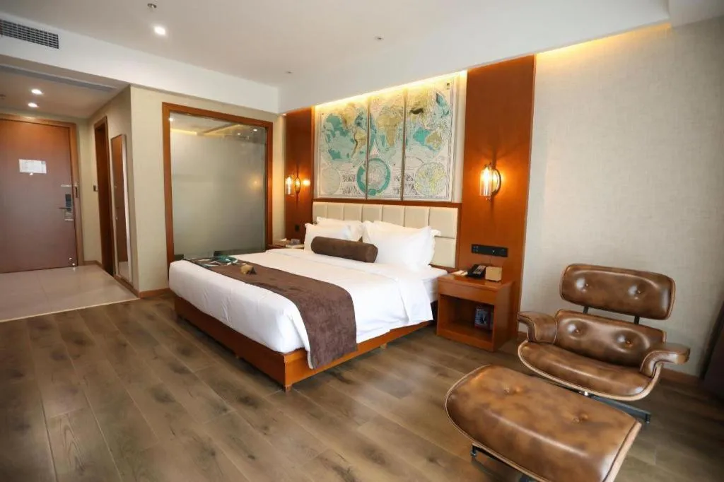 Bed in James Joyce Coffetel Xinyang Municipal Government Railway Station