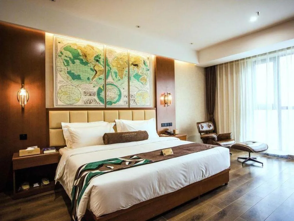 Bed in James Joyce Coffetel Xinyang Municipal Government Railway Station