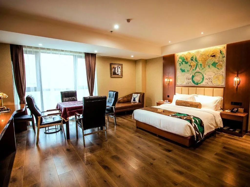 Bed in James Joyce Coffetel Xinyang Municipal Government Railway Station