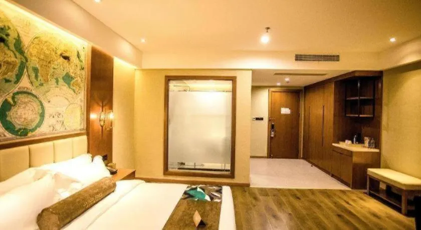 Bed in James Joyce Coffetel Xinyang Municipal Government Railway Station