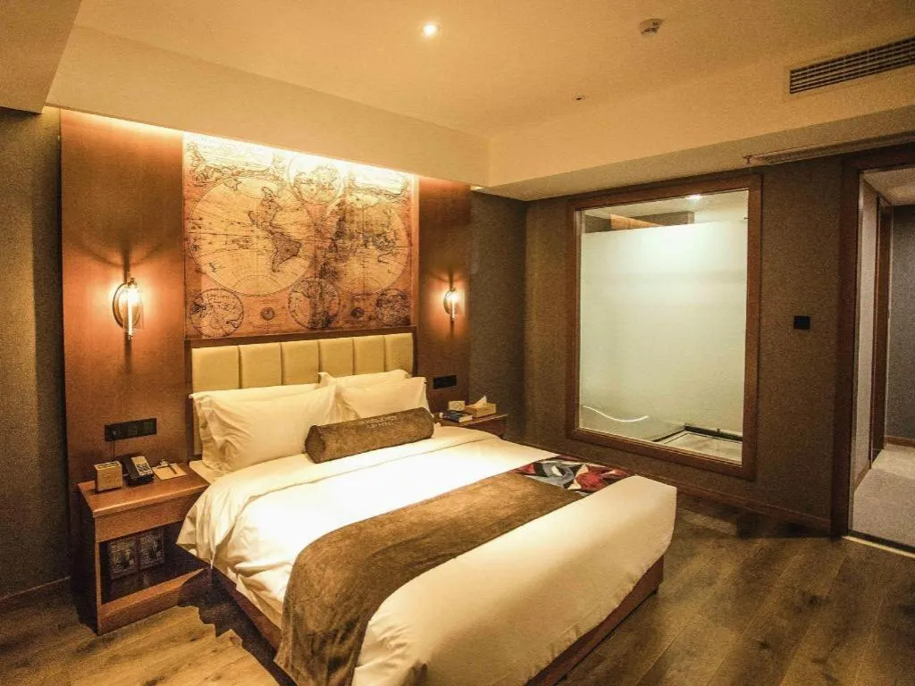 Bed in James Joyce Coffetel Xinyang Municipal Government Railway Station