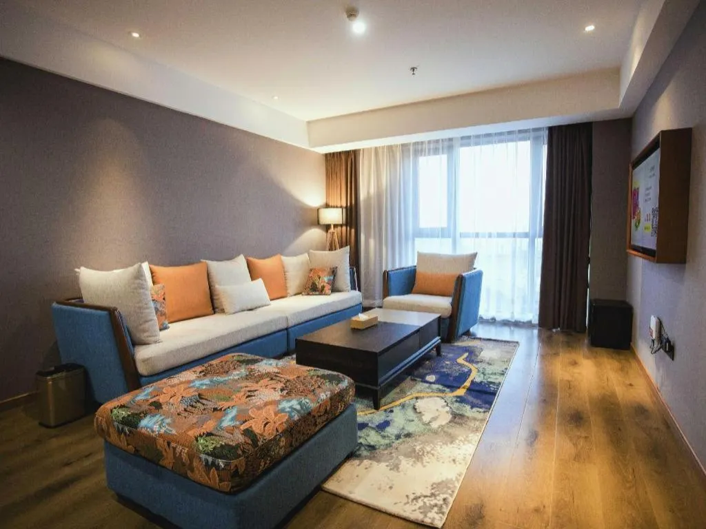 Bed in James Joyce Coffetel Xinyang Municipal Government Railway Station