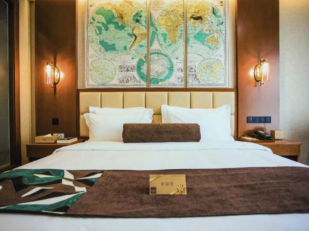 Bed in James Joyce Coffetel Xinyang Municipal Government Railway Station