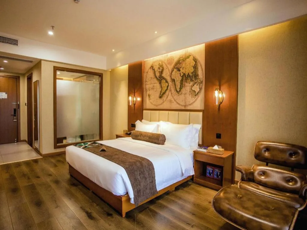 Bed in James Joyce Coffetel Xinyang Municipal Government Railway Station