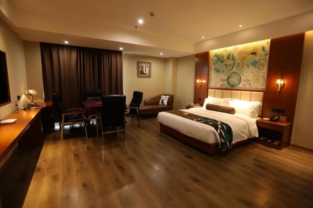 Bed in James Joyce Coffetel Xinyang Municipal Government Railway Station