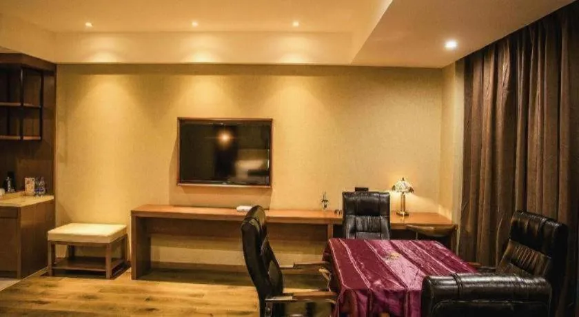 Bed in James Joyce Coffetel Xinyang Municipal Government Railway Station