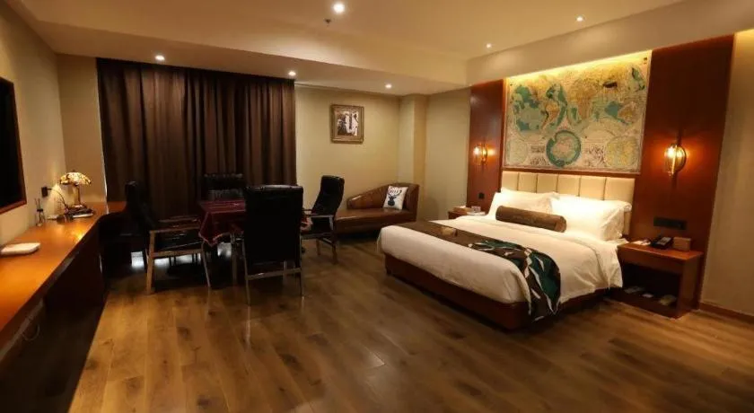 Bed in James Joyce Coffetel Xinyang Municipal Government Railway Station