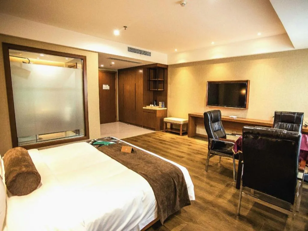 Bed in James Joyce Coffetel Xinyang Municipal Government Railway Station