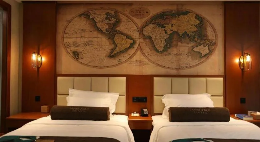 Bed in James Joyce Coffetel Xinyang Municipal Government Railway Station