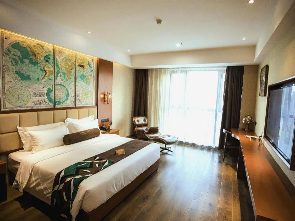 Bed in James Joyce Coffetel Xinyang Municipal Government Railway Station