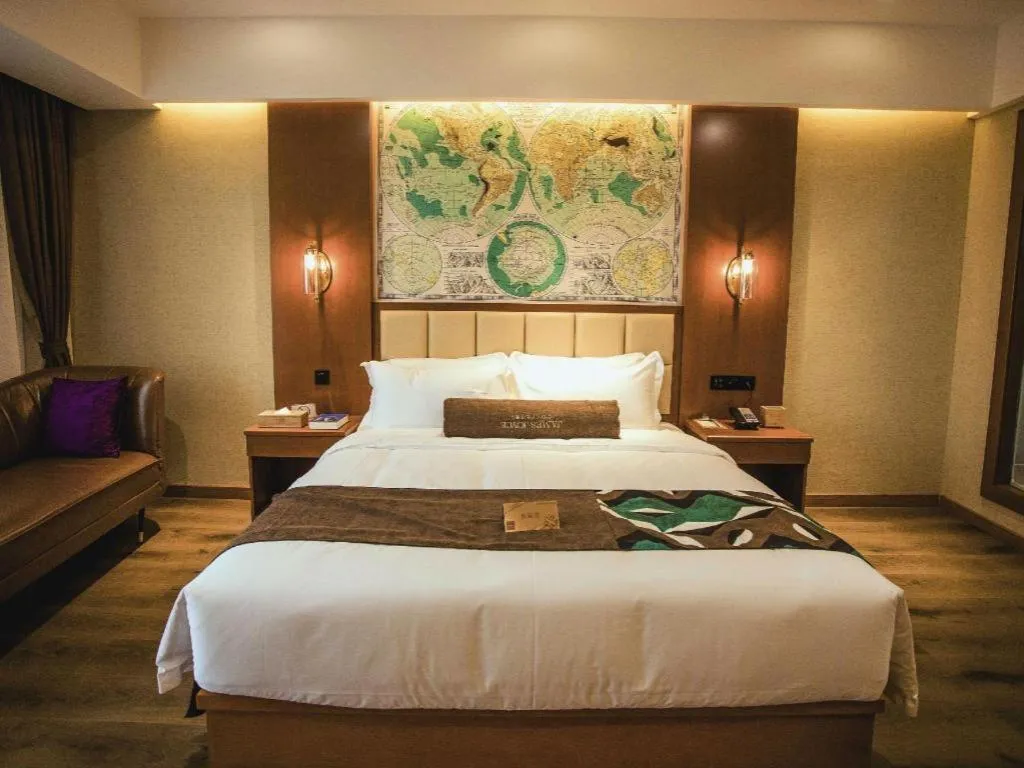 Bed in James Joyce Coffetel Xinyang Municipal Government Railway Station