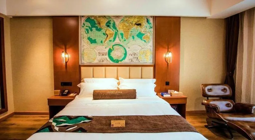 Bed in James Joyce Coffetel Xinyang Municipal Government Railway Station