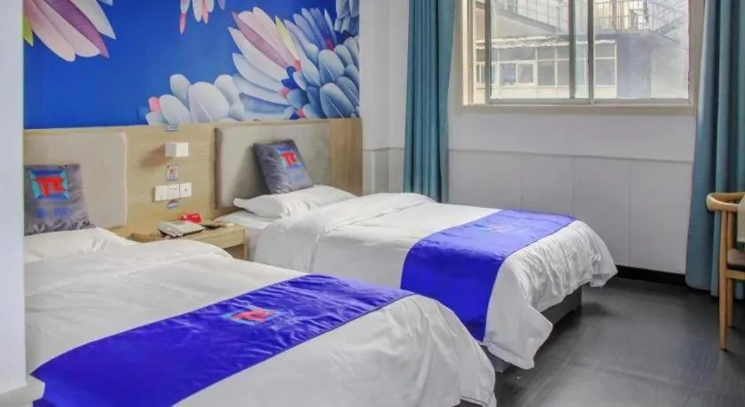 Bed in Pai Hotel Xuzhou Railway Station
