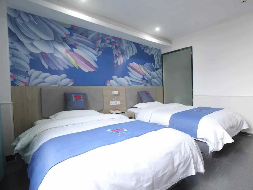 Bed in Pai Hotel Xuzhou Railway Station