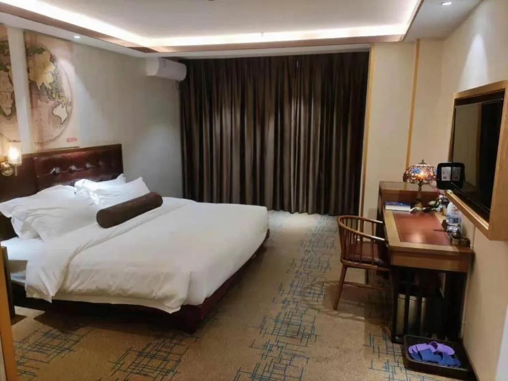 Bed in James Joyce Coffetel Lijiang Ancient City Dashuiche