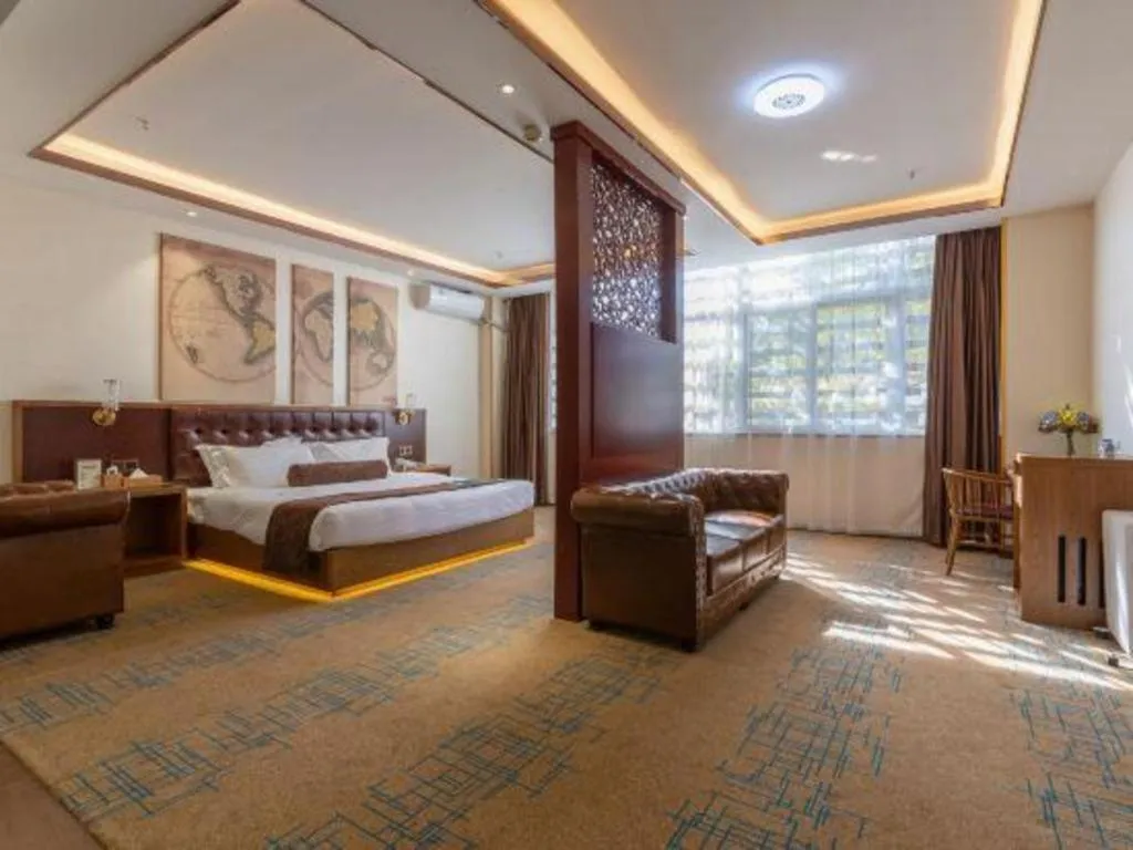 Bed in James Joyce Coffetel Lijiang Ancient City Dashuiche