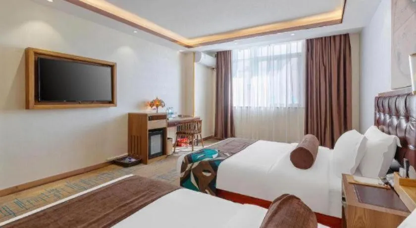 Bed in James Joyce Coffetel Lijiang Ancient City Dashuiche