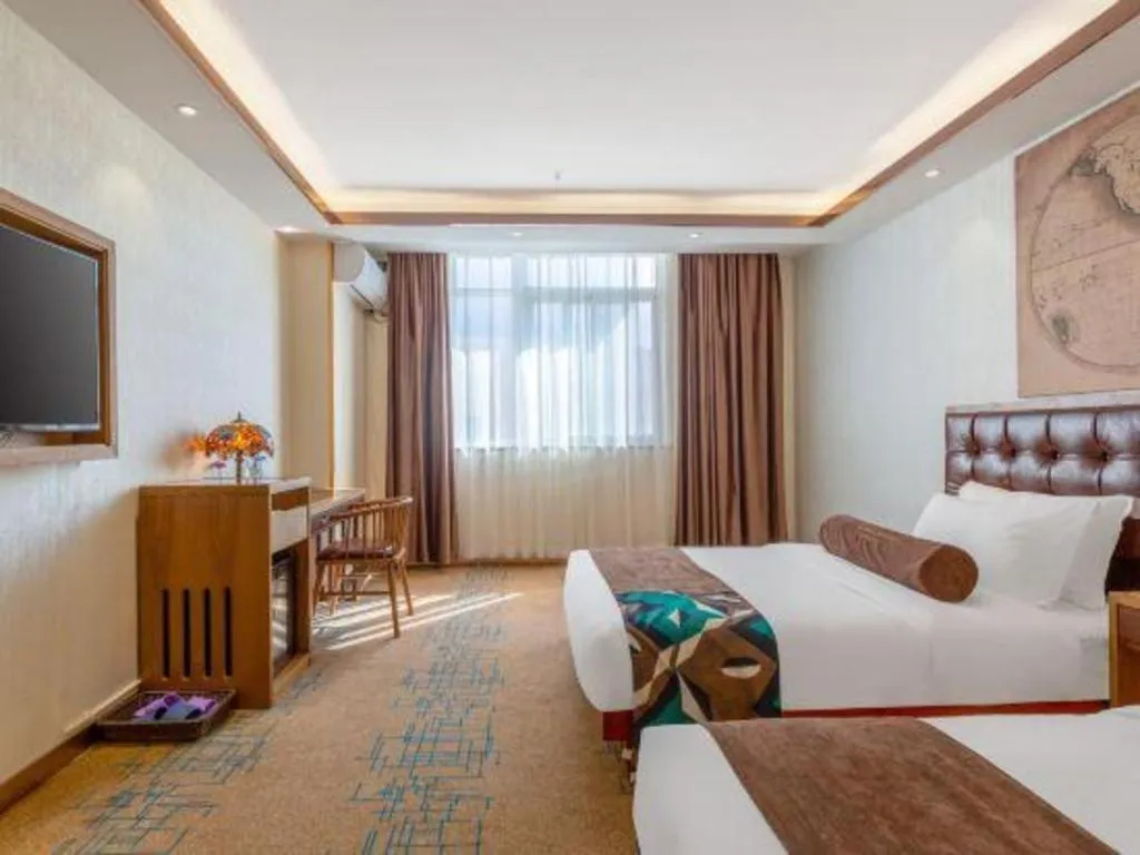 Bed in James Joyce Coffetel Lijiang Ancient City Dashuiche