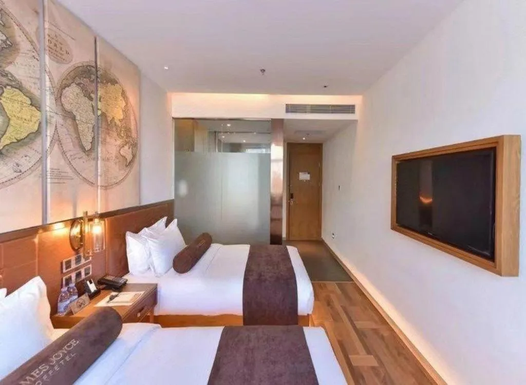 Bed in James Joyce Coffetel Beijing Tongzhou Guoyuan Metro Station