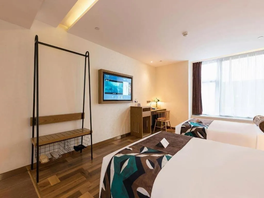 Bed in James Joyce Coffetel Beijing Tongzhou Guoyuan Metro Station