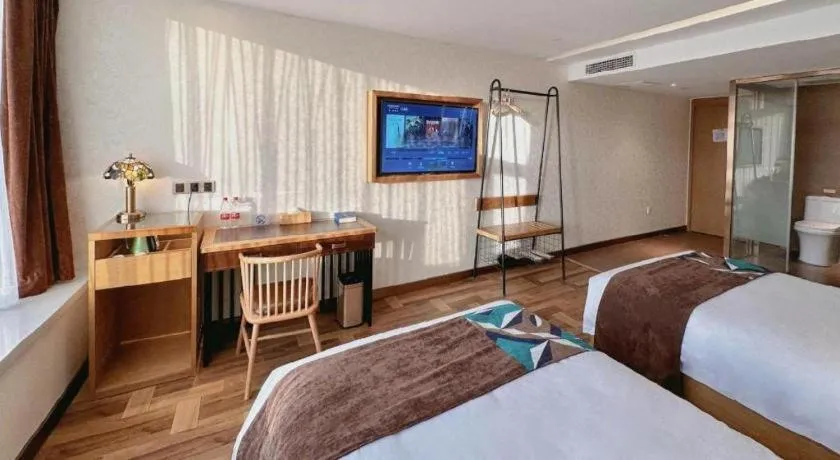 Bed in James Joyce Coffetel Beijing Tongzhou Guoyuan Metro Station