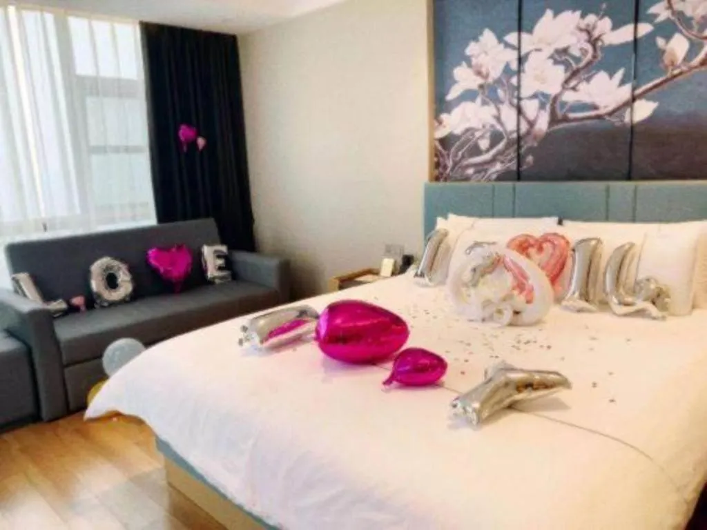 Bed in Magnotel Hotel Guangyuan Nanhe Bus Station Beijing Road