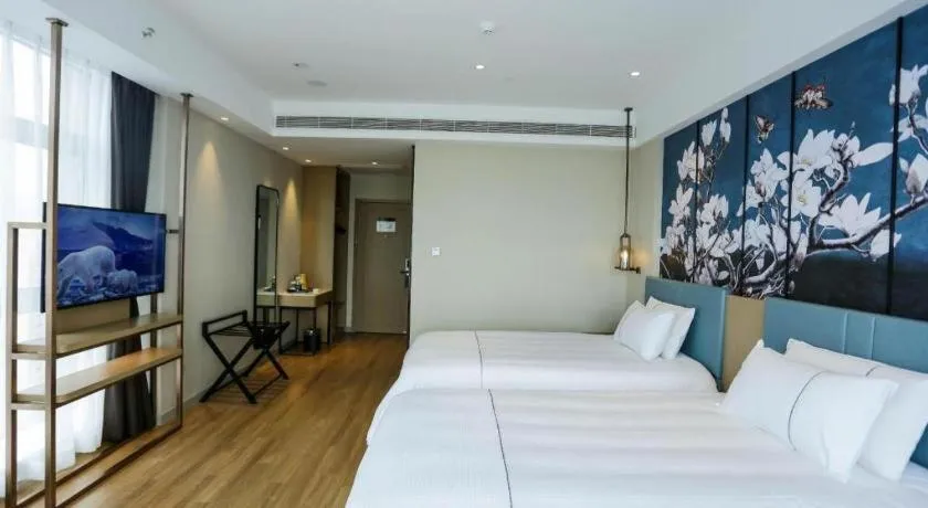 Bed in Magnotel Hotel Guangyuan Nanhe Bus Station Beijing Road