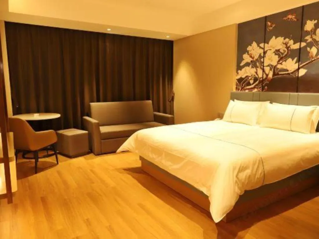 Bed in Magnotel Hotel Guangyuan Nanhe Bus Station Beijing Road