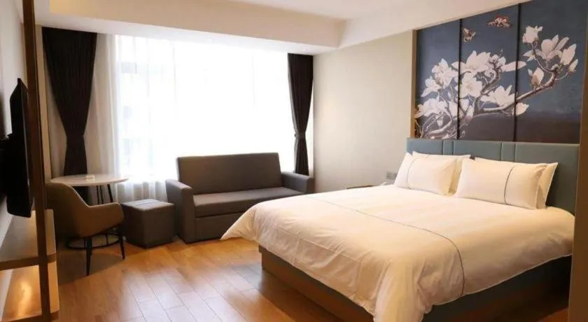 Bed in Magnotel Hotel Guangyuan Nanhe Bus Station Beijing Road