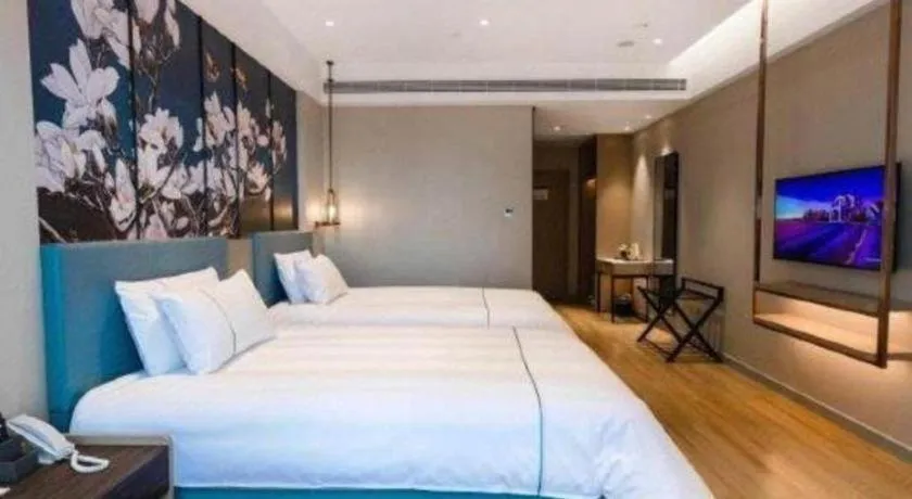 Bed in Magnotel Hotel Guangyuan Nanhe Bus Station Beijing Road