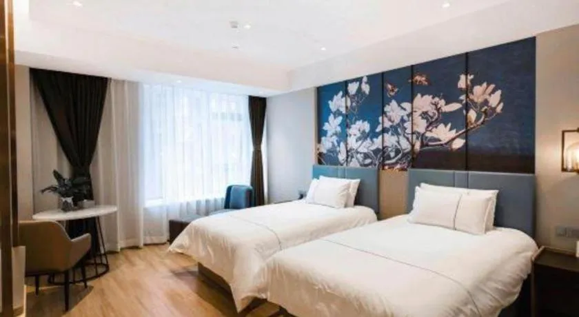 Bed in Magnotel Hotel Guangyuan Nanhe Bus Station Beijing Road